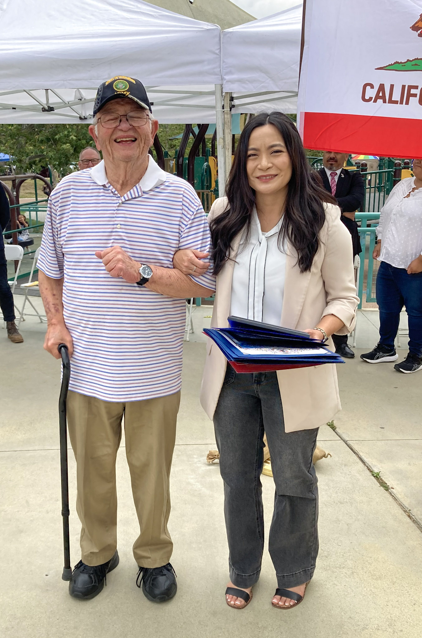 LAPD officers and event staff posing together