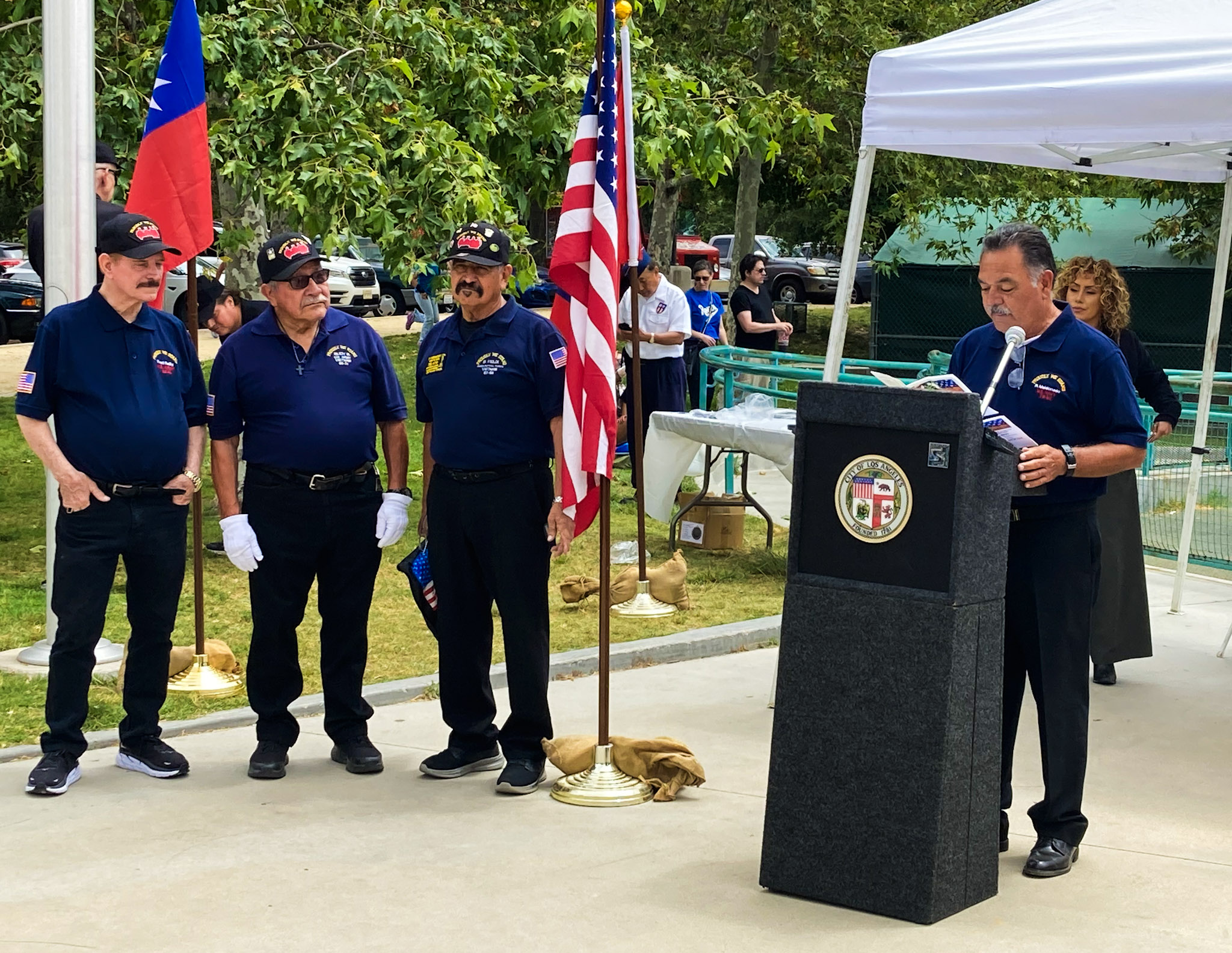 Raffle table volunteers supporting veterans